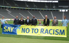 Blatter, Beckenbauer and Co behind anti-racism banner, Berlin Stadium
